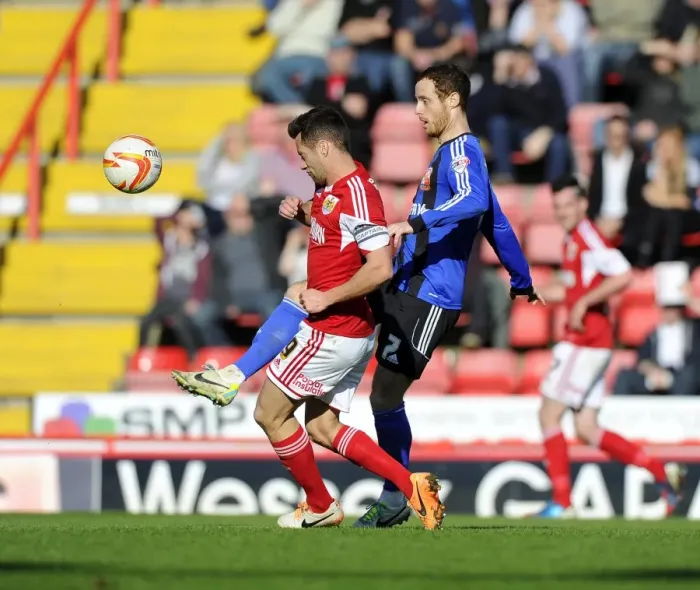 Framed Print : Clash at Ashton Gate: Bristol City vs Swindon Town - 15 March 2014 Framed Print : Clash at Ashton Gate: Bristol City vs Swindon Town - 15 March 2014