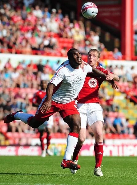Clash at Ashton Gate: David Clarkson vs. Wes Morgan in the Championship Battle between Bristol City and Nottingham Forest - April 25, 2011