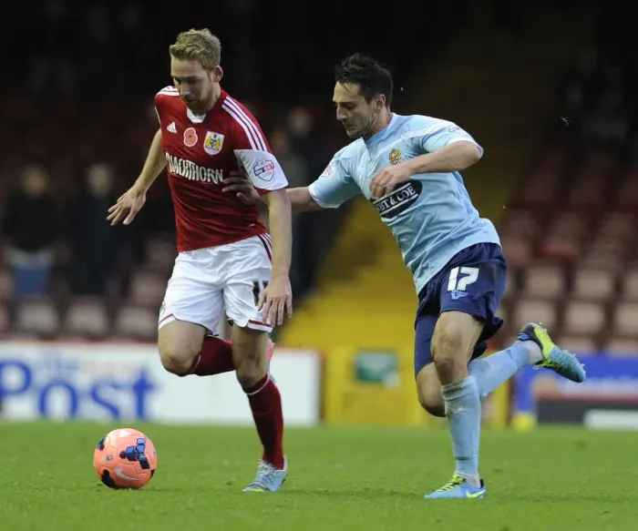 Framed Print : Clash at Ashton Gate: A FA Cup Showdown between Scott Wagstaff and Luke Howell Framed Print : Clash at Ashton Gate: A FA Cup Showdown between Scott Wagstaff and Luke Howell