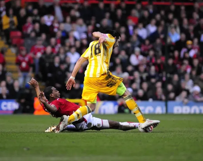 Framed Print : Clash at Ashton Gate: Marvin Elliott vs. Jonas Gutierrez, Bristol City vs. Newcastle United, Championship 2010 Framed Print : Clash at Ashton Gate: Marvin Elliott vs. Jonas Gutierrez, Bristol City vs. Newcastle United, Championship 2010
