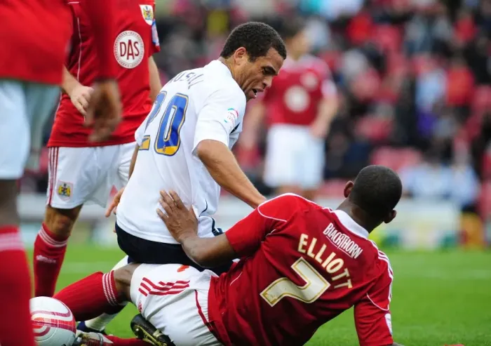 Framed Print : Clash at Ashton Gate: Marvin Elliott vs. Darel Russell in Bristol City vs. Preston North End Championship Match, November 2010 Framed Print : Clash at Ashton Gate: Marvin Elliott vs. Darel Russell in Bristol City vs. Preston North End Championship Match, November 2010