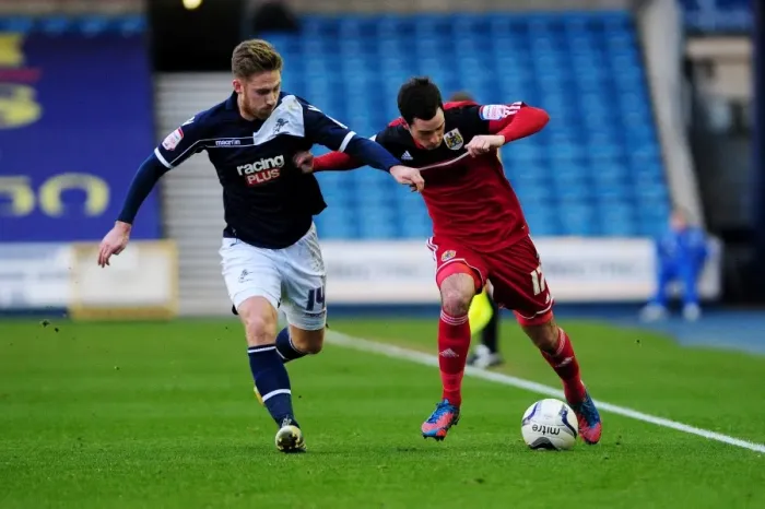 Framed Print : Clash at The Den: Millwall's James Henry Pressures Bristol City's Gregg Cunningham