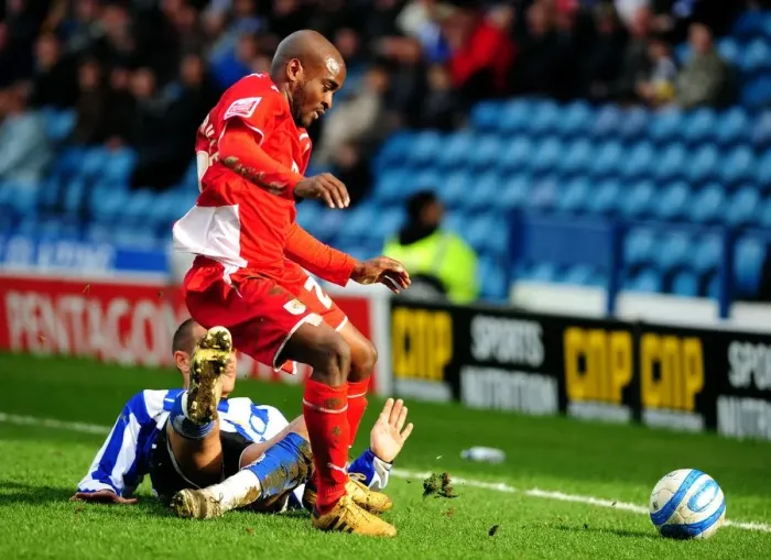 Framed Print : Clash at Hillsborough: Leon Clarke Stops Jamal Campbell-Ryce's Charge - Championship Showdown between Sheffield Wednesday and Bristol City (05 / 04 / 2010) Framed Print : Clash at Hillsborough: Leon Clarke Stops Jamal Campbell-Ryce's Charge - Championship Showdown between Sheffield Wednesday and Bristol City (05 / 04 / 2010)