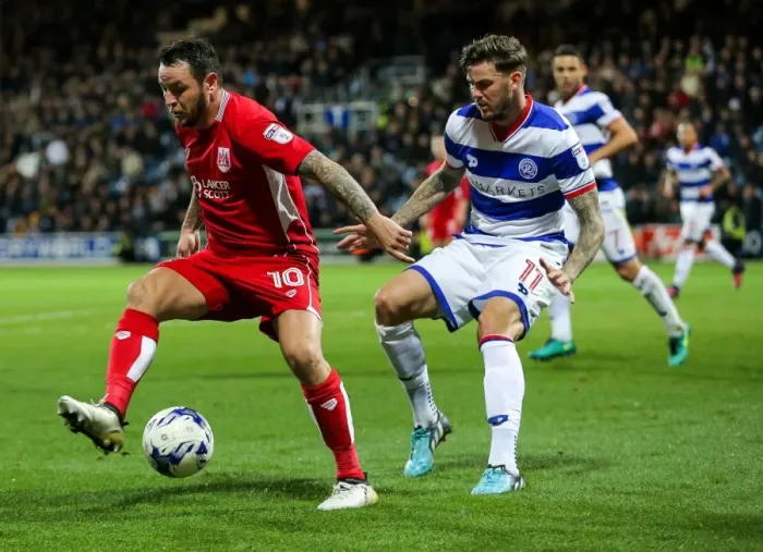 Framed Print : Clash at Loftus Road: Lee Tomlin vs Ben Gladwin in QPR vs Bristol City Championship Showdown