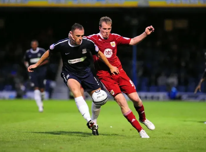 Framed Print : Clash at Roots Hall: David Clarkson vs Graham Coughlan in the Carling Cup Battle between Southend United and Bristol City (August 10, 2010)