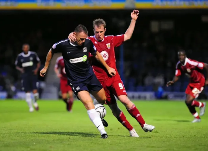 Framed Print : Clash at Roots Hall: David Clarkson vs. Graham Coughlan in the Carling Cup Battle between Southend United and Bristol City (August 10, 2010)