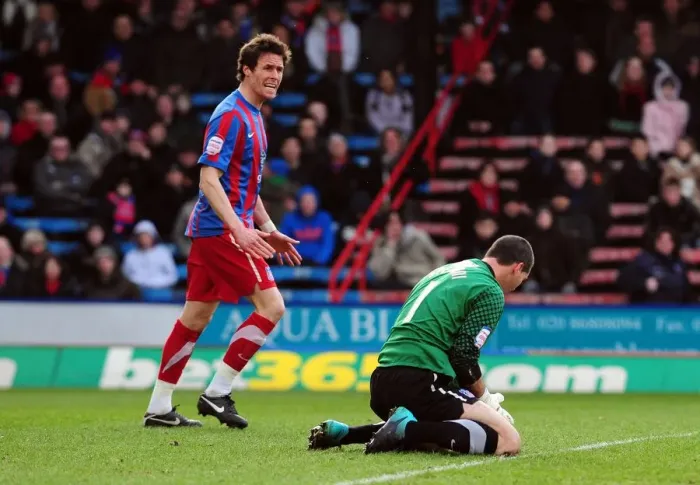 Framed Print : Clash at Selhurst Park: Speroni and McCarthy's Duel for the Ball, Championship Showdown between Crystal Palace and Bristol City (January 22, 2011)