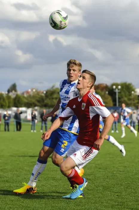 Framed Print : Clash at SGS Wise Campus: Bevan vs Collar - Intense Moment from Bristol City U18 vs Brighton & Hove Albion U18 Football Match Framed Print : Clash at SGS Wise Campus: Bevan vs Collar - Intense Moment from Bristol City U18 vs Brighton & Hove Albion U18 Football Match