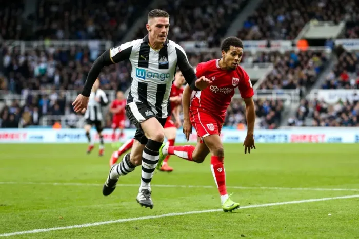 Framed Print : Clash at St. James Park: Ciaran Clark and Korey Smith Battle it Out