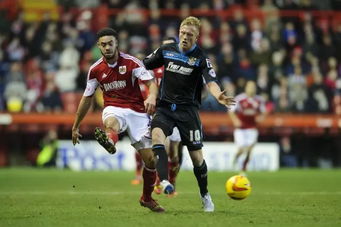 Framed Print : Clash of the Titans: Intense Moment between Derrick Williams and Jordan Burrow in Bristol City vs Stevenage Football Match Framed Print : Clash of the Titans: Intense Moment between Derrick Williams and Jordan Burrow in Bristol City vs Stevenage Football Match
