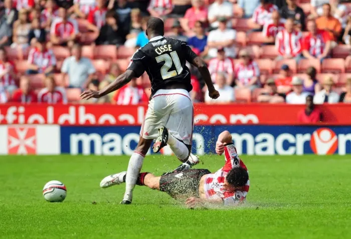 Framed Print : Clash of Titans: Lowry vs. Cisse - Sheffield United vs. Bristol City Championship Showdown, 23rd April 2011: A Football Rivalry Unfolds at Bramall Lane Framed Print : Clash of Titans: Lowry vs. Cisse - Sheffield United vs. Bristol City Championship Showdown, 23rd April 2011: A Football Rivalry Unfolds at Bramall Lane