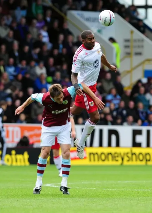 Framed Print : Clash at Turf Moor: Marvin Elliott vs. Wade Elliott - Burnley vs. Bristol City, Championship Football, 2010