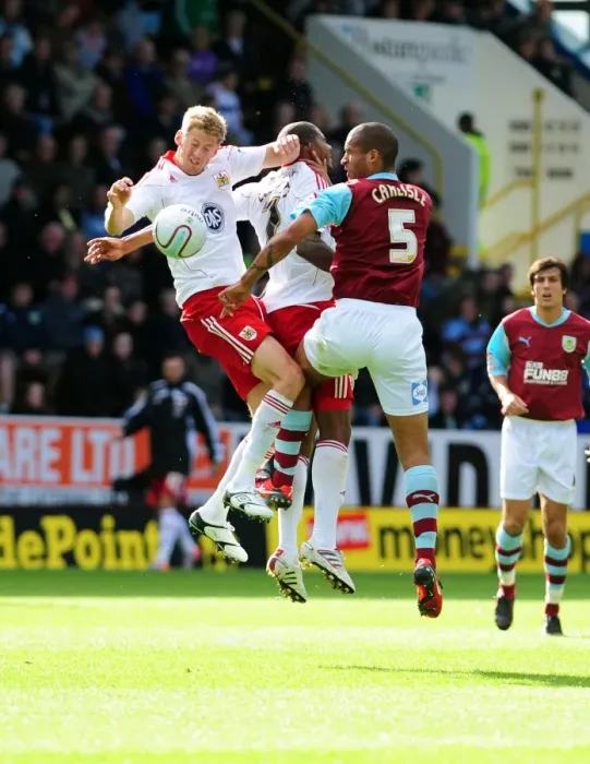 Framed Print : Clash at Turf Moor: Stead and Elliott Battle for Aerial Supremacy against Burnley's Carlisle Framed Print : Clash at Turf Moor: Stead and Elliott Battle for Aerial Supremacy against Burnley's Carlisle