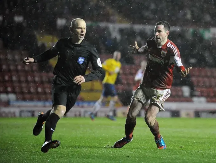 Framed Print : Controversial Clash: Greg Cunningham vs Referee during Bristol City vs Coventry City
