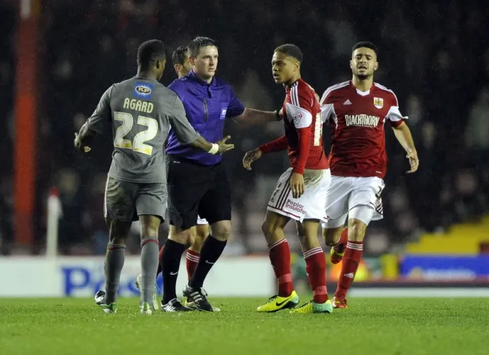 Framed Print : Controversial Escape: Kieran Agard Avoids Discipline for Heading into Bobby Reid during Bristol City vs Rotherham United Framed Print : Controversial Escape: Kieran Agard Avoids Discipline for Heading into Bobby Reid during Bristol City vs Rotherham United