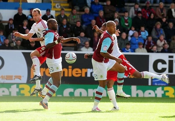 Controversial Moment: Burnley's Andre Bikey Sneakily Handles Ball in the Box Unnoticed by Referee during Burnley vs. Bristol City Championship Match (September 25, 2010)