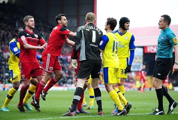 Controversial Penalty and Heated Confrontation: Greg Cunningham's Diving Incident Sparks Tension between Bristol City and Sheffield Wednesday Players
