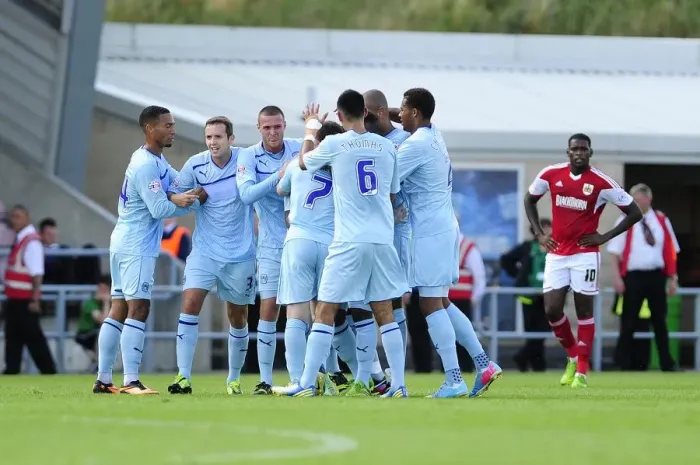 Framed Print : Coventry's Wilson Scores and Celebrates with Team Mates vs. Bristol City (August 11, 2013)
