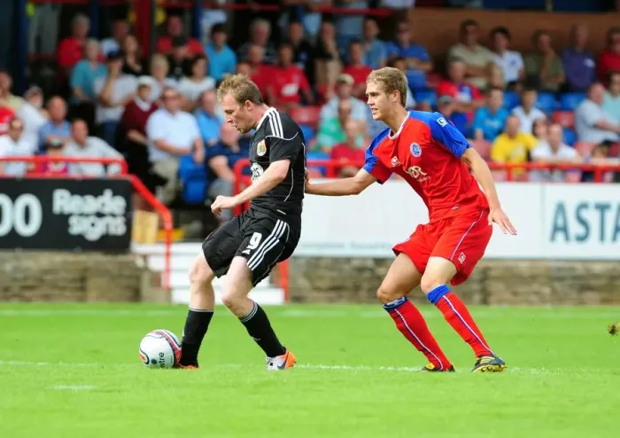 Framed Print : David Clarkson's Dramatic Post-Hit: Aldershot vs. Bristol City