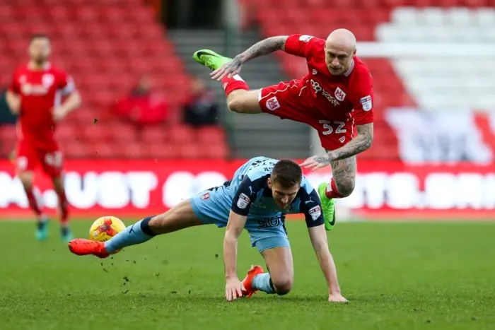 Framed Print : David Cotterill's Aerial Battle: A Peak Moment in the Bristol City vs Rotherham United Championship Clash Framed Print : David Cotterill's Aerial Battle: A Peak Moment in the Bristol City vs Rotherham United Championship Clash