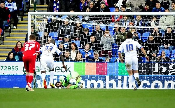 David James Saves Penalty, Roberts Scores Rebound: A Dramatic Moment in the 2012 Championship Match Between Reading and Bristol City