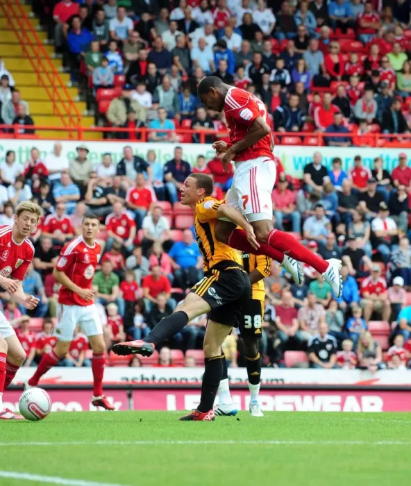 Framed Print : Defiant Marvin Elliott's Near-Miss Header: A Moment of Drama in the 2011 Championship Clash between Bristol City and Hull City