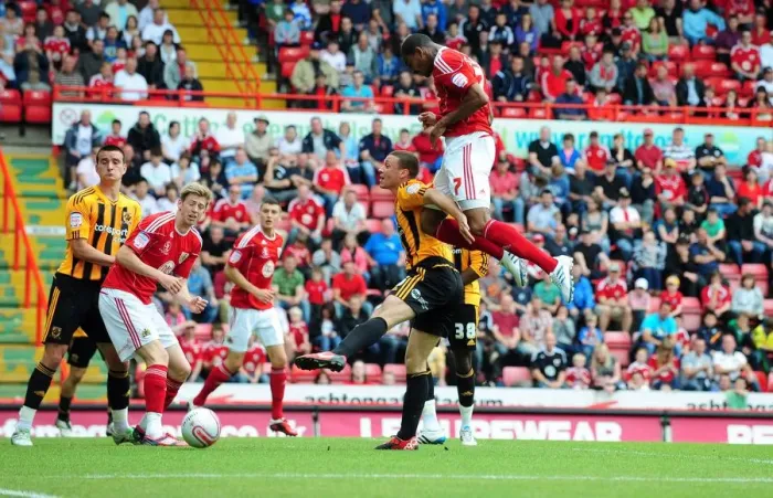 Framed Print : Defiant Moment: Marvin Elliott's Near-Miss Header for Bristol City against Hull City, Championship 2011
