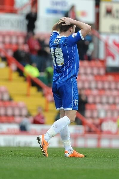 Dejected Charlie Lee After Gillingham's Goal in Bristol City's 2-1 Loss, March 1, 2014