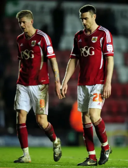 Framed Print : Dejected Duo: McManus and Stead Leave Ashton Gate After Bristol City's Loss to Watford Framed Print : Dejected Duo: McManus and Stead Leave Ashton Gate After Bristol City's Loss to Watford