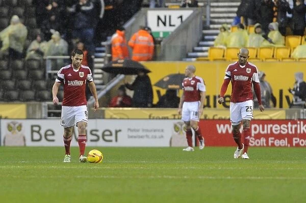 Dejected Duo: Sam Baldock and Marvin Elliott of Bristol City After Loss at Molineux