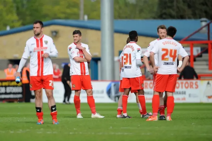 Framed Print : Dejected Stevenage Players After 1-3 Defeat to Bristol City, Resulting in Their Relegation Framed Print : Dejected Stevenage Players After 1-3 Defeat to Bristol City, Resulting in Their Relegation