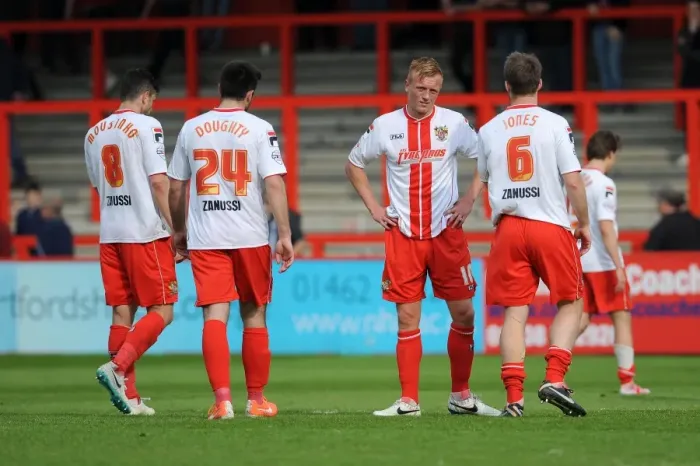 Framed Print : Dejected Stevenage Players After 1-3 Loss to Bristol City, Resulting in Their Relegation