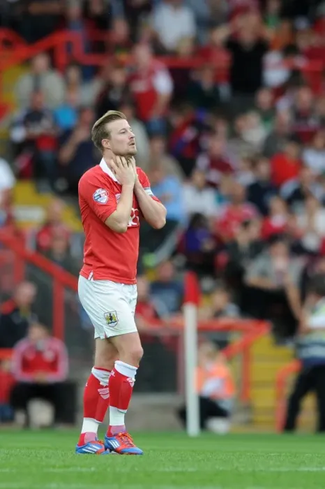 Framed Print : Dejected Wade Elliott After Costly Giveaway in Bristol City's Loss to MK Dons Framed Print : Dejected Wade Elliott After Costly Giveaway in Bristol City's Loss to MK Dons