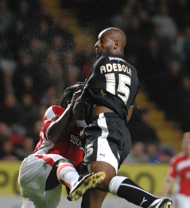 Framed Print : Dele Adebola vs Linvoy Primus: Intense Battle for the Ball (Charlton Athletic vs Bristol City)
