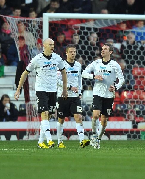 Derby County Claims Championship Victory: Craig Bryson and Teammates Celebrate Goal Against Bristol City (15 / 12 / 2012)