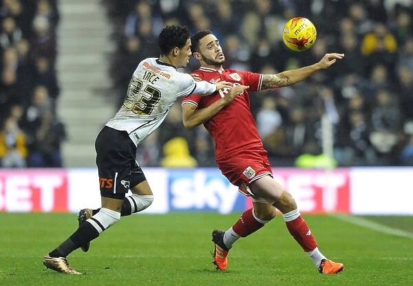 Derby County vs. Bristol City: Intense Battle Between Derrick Williams and Thomas Ince