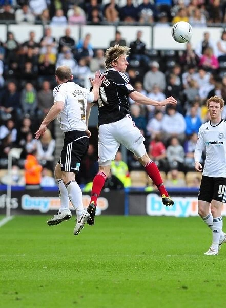 Derby County vs. Bristol City: Intense Battle for the Championship Ball - Martyn Woolford vs. Gareth Roberts (30th April 2011)