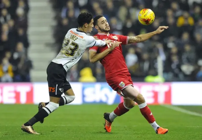 Framed Print : Derby County vs. Bristol City: Intense Battle Between Derrick Williams and Thomas Ince Framed Print : Derby County vs. Bristol City: Intense Battle Between Derrick Williams and Thomas Ince