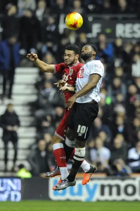 Framed Print : Derby County vs. Bristol City: Intense Clash Between Derrick Williams and Darren Bent Framed Print : Derby County vs. Bristol City: Intense Clash Between Derrick Williams and Darren Bent