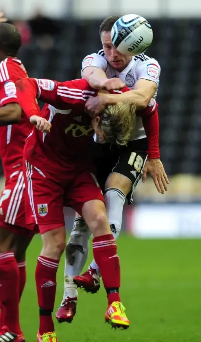 Framed Print : Derby County vs. Bristol City: Martyn Woolford Foul by Ben Davies - Championship Match, 10th December 2011 Framed Print : Derby County vs. Bristol City: Martyn Woolford Foul by Ben Davies - Championship Match, 10th December 2011