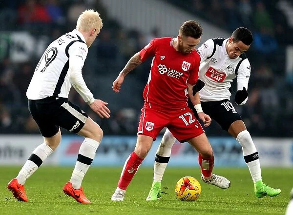 Derby County vs. Bristol City: Matty Taylor Faces Off Against Hughes and Ince