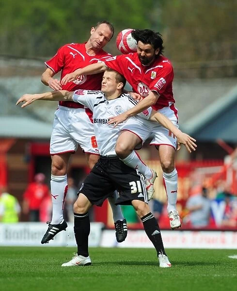 Derby County's Tomasz Cywka Clashes with Bristol City's Paul Hartley and Louis Carey for Aerial Ball in Championship Match, 24 / 04 / 2010