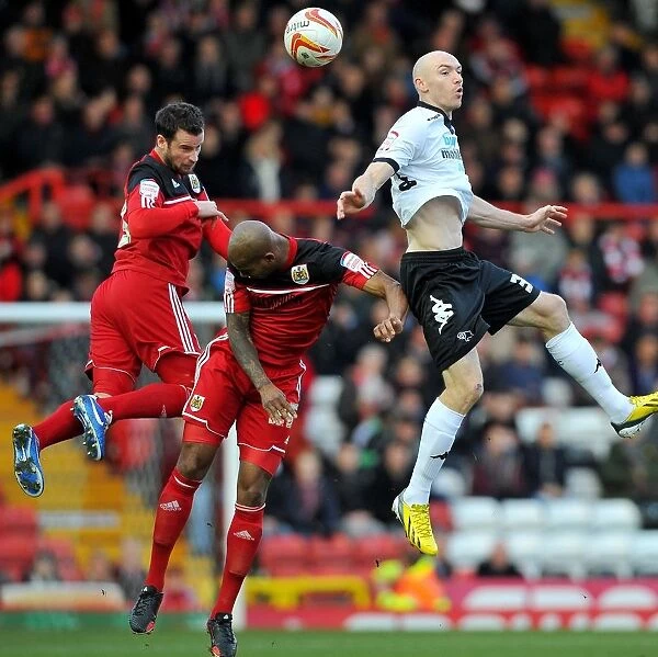 Derby's Sammon Soars Above Bristol City Defenders