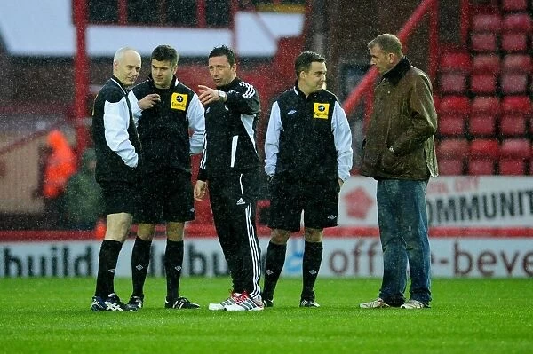 Derek McInnes Discusses with Officials as Bristol City vs. Watford Championship Match is Postponed (December 2012)