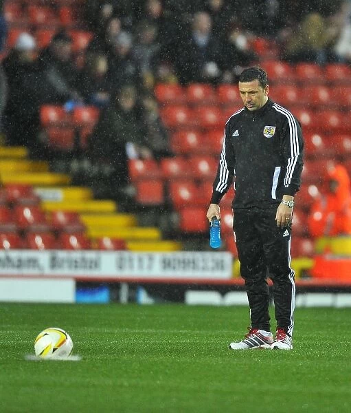Derek McInnes Examines Unplayable Floodlit Pitch as Championship Match Between Bristol City and Watford is Abandoned (December 2012)