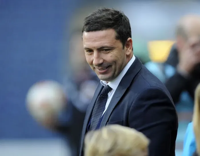 Framed Print : Derek McInnes Smile: A Young Mascot's Moment at Ewood Park during Blackburn vs. Bristol City (FA Cup)