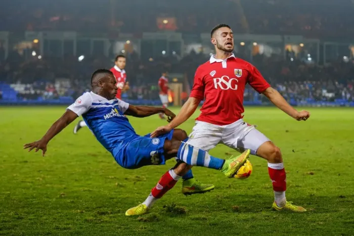 Framed Print : Derrick Williams vs Aaron McLean: Intense Clash at ABAX Stadium - Peterborough United vs Bristol City, Sky Bet League 1