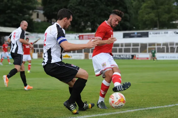 Framed Print : Derrick Williams vs. Andy Gallinagh: A Clash in Pre-Season Friendly Football at Twerton Park (Bath City vs. Bristol City, 10th July 2015) Framed Print : Derrick Williams vs. Andy Gallinagh: A Clash in Pre-Season Friendly Football at Twerton Park (Bath City vs. Bristol City, 10th July 2015)