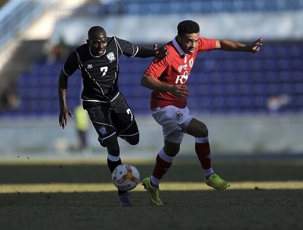 Derrick Williams vs Tobo Piet: Intense Clash Between Extension Gunners and Bristol City, 2014