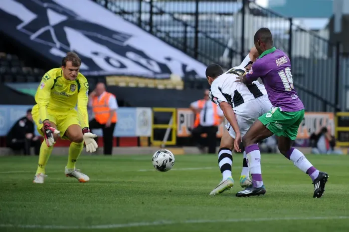 Framed Print : Determined Kieran Agard Chases Down the Ball Despite Head Injury in Notts County vs. Bristol City Match Framed Print : Determined Kieran Agard Chases Down the Ball Despite Head Injury in Notts County vs. Bristol City Match